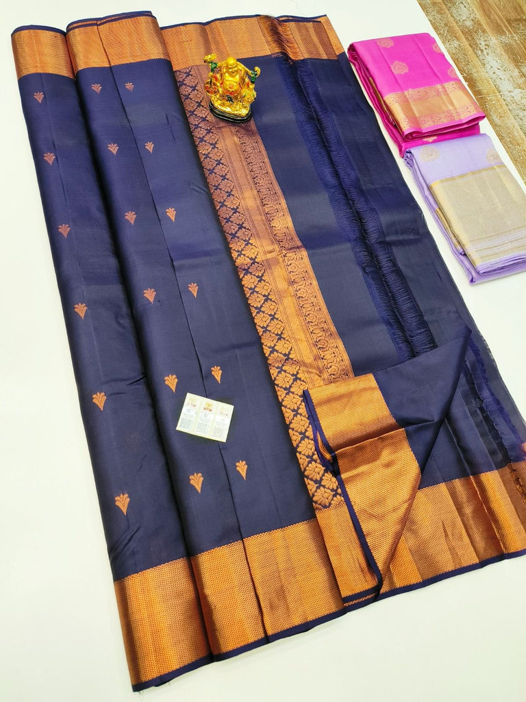 Pure Kanchipuram Silk Saree Navy Blue with designs all over the body and Copper Zari Border.JPG