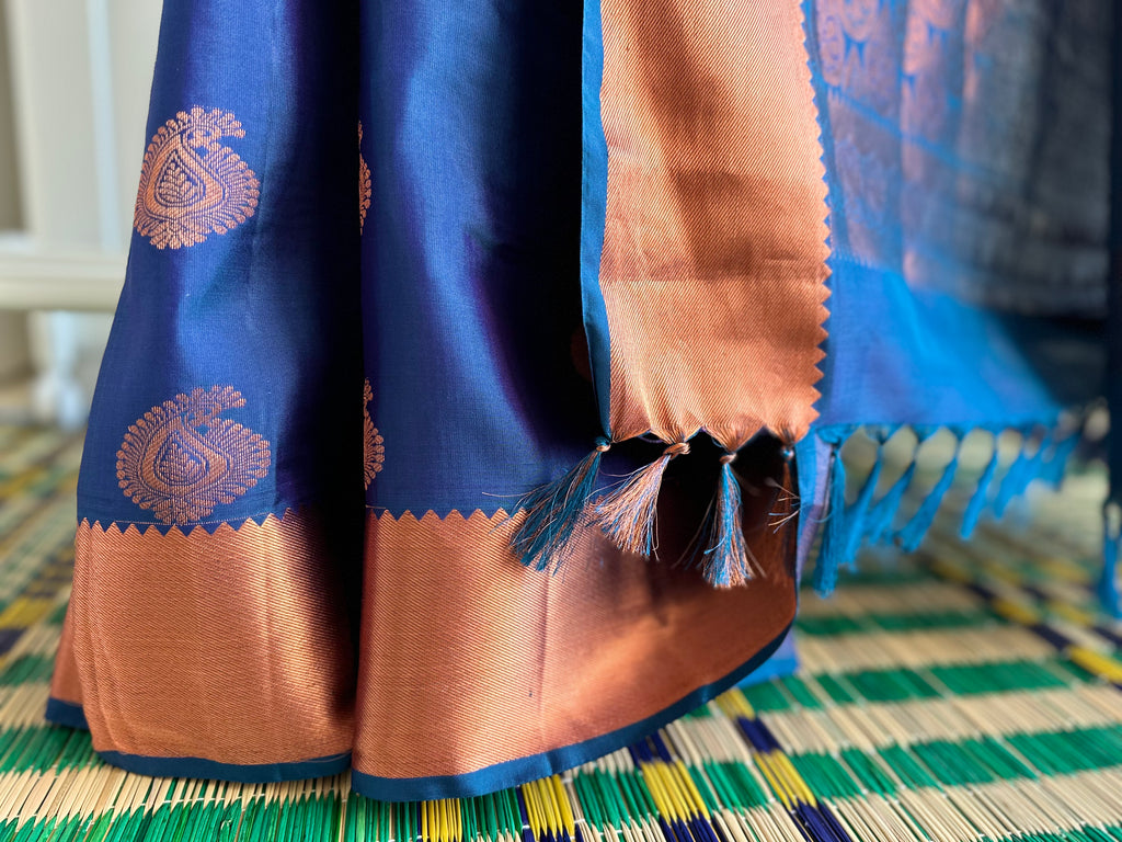 Pure Kanchipuram Silk Saree Dark Blue with designs all over the body and Copper Zari Border