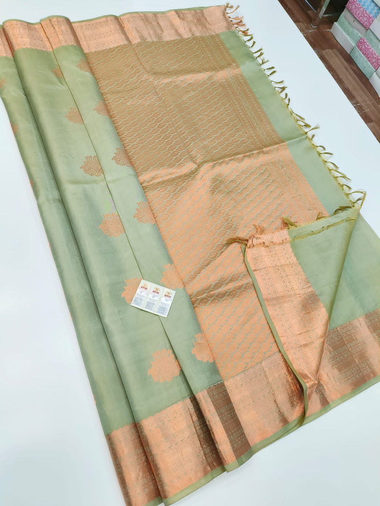 Pure Kanchipuram Silk Saree Green with designs all over the body and Copper Zari Border