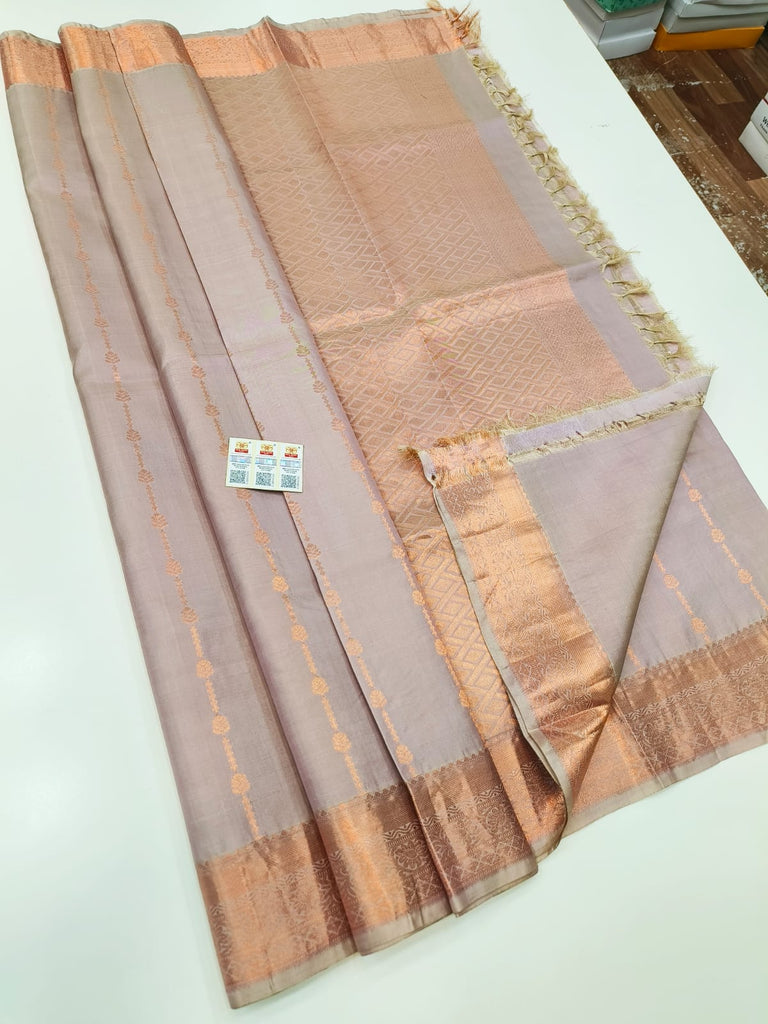 Pure Kanchipuram Silk Saree Light Brown with designs all over the body and Copper Zari Border