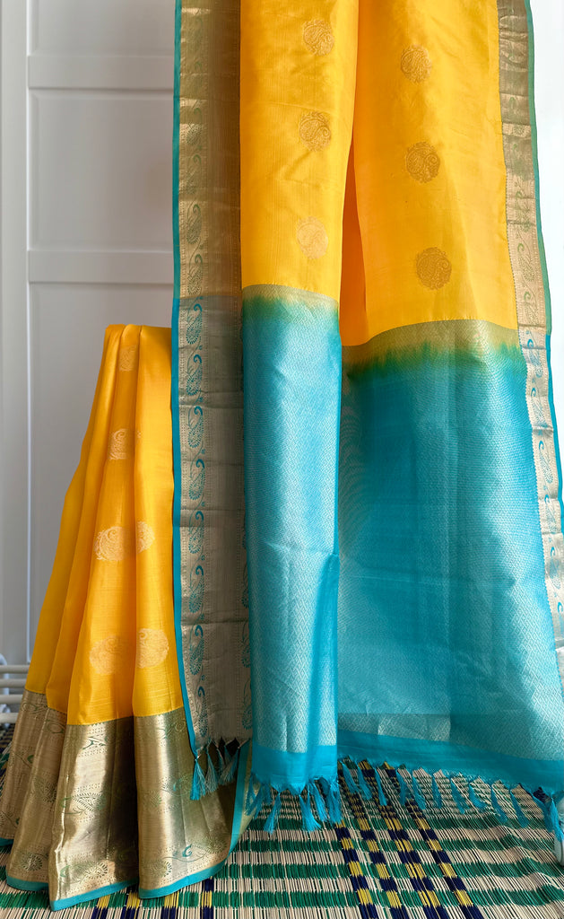 Pure Kanchipuram Silk Saree Yellow and Teal Blue with designs all over the body and Long Golden Zari Border