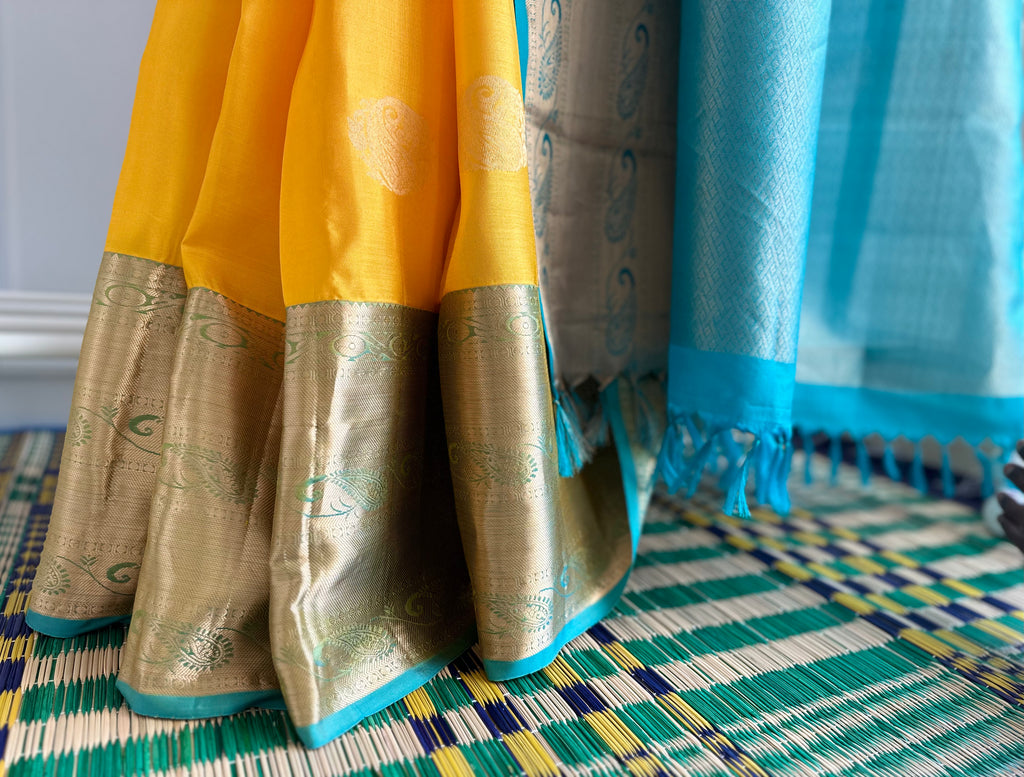 Pure Kanchipuram Silk Saree Yellow and Teal Blue with designs all over the body and Long Golden Zari Border