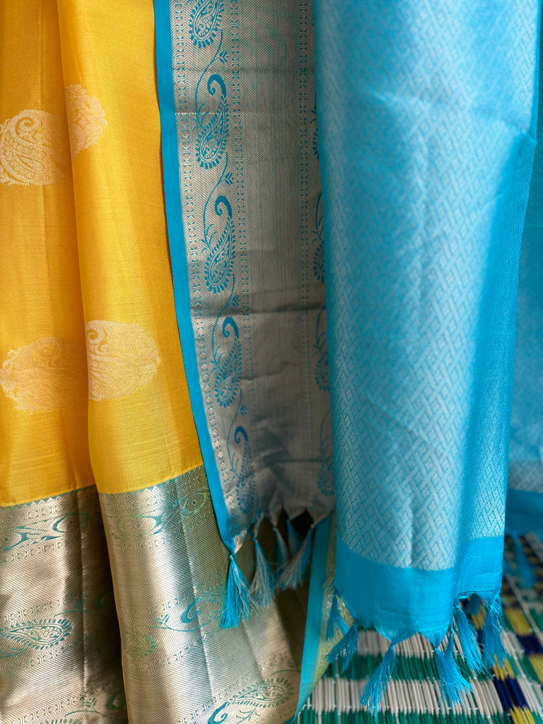 Pure Kanchipuram Silk Saree Yellow and Teal Blue with designs all over the body and Long Golden Zari Border