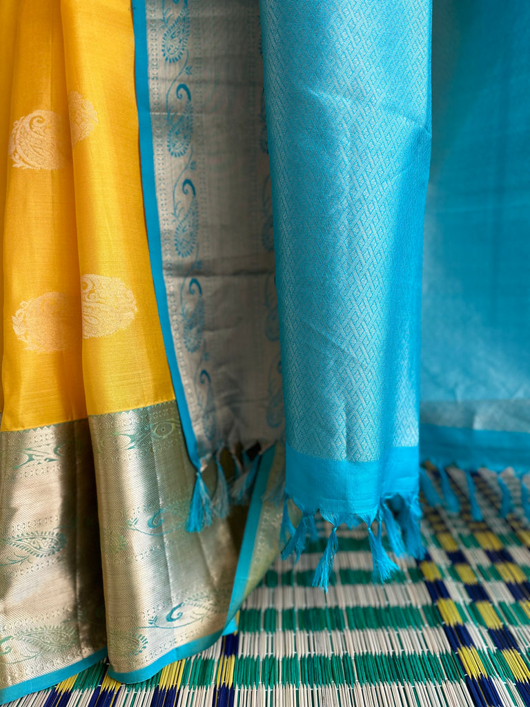 Pure Kanchipuram Silk Saree Yellow and Teal Blue with designs all over the body and Long Golden Zari Border